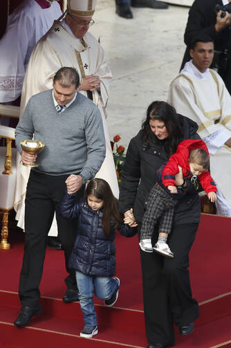 Presenting the offertory gifts to Pope Francis in St. Peter's Square, November 2014.