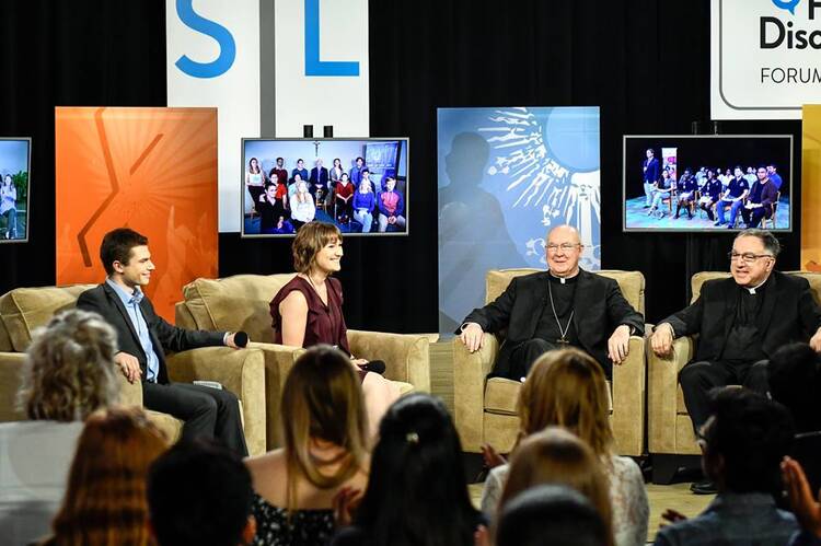 Young adults gathered in the Toronto studios of Salt + Light Catholic Media this week for a town hall meeting about the church. The event was hosted by Julian Paparella, left, Emilie Callan, Cardinal Kevin Farrell and the Rev. Thomas Rosica. (Courtesy: Salt + Light)