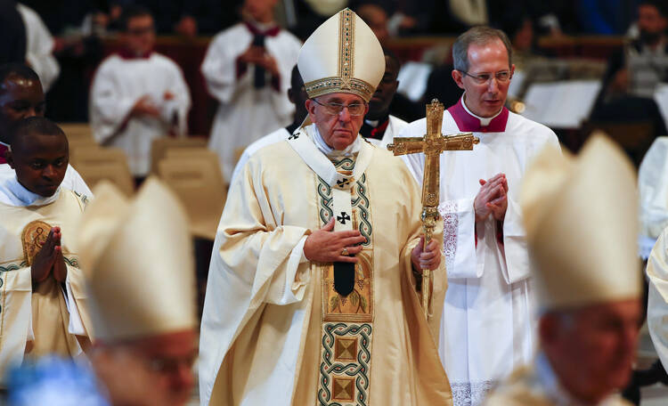 Pope Francis carries his crosier after celebrating Mass on the feast of the Epiphany in St. Peter's Basilica at the Vatican on Jan. 6. (CNS photo/Tony Gentile, Reuters)