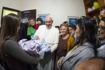 Pope Francis at a home in the Varginha slum in Rio de Janeiro on July 25.