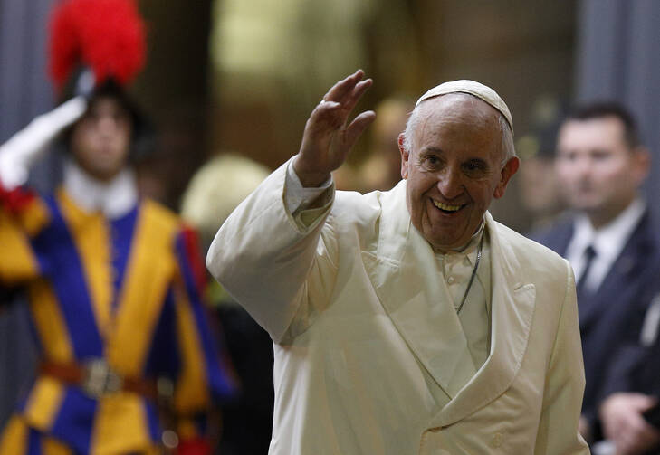 Pope Francis waves as he leaves the final session of the Synod of Bishops on the family at the Vatican, Oct. 24 (CNS photo/Paul Haring). 