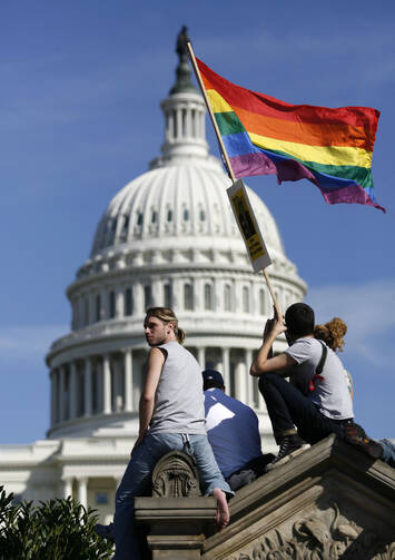 People gather near the U.S. Capitol during a gay rights demonstration in Washington, Oct. 11, 2009.