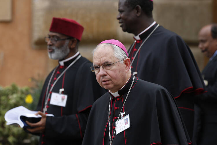 Archbishop Jose H. Gomez of Los Angeles leave a session of the Synod of Bishops on the family at the Vatican Oct. 14. (CNS photo/Paul Haring) 