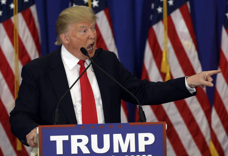 Republican presidential candidate Donald Trump speaks at the Trump National Golf Club on Tuesday in Jupiter, Fla. (AP Photo/Lynne Sladky)