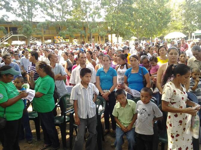 Hundreds marched through the streets of El Progreso, Honduras, on Sept. 14 to honor the life of Jim (Guadalupe) Carney, S.J., of St. Louis, Mo. (Credit: Radio Progreso)