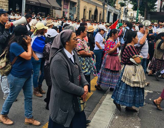 Protestors march to support a U.N. anti-corruption commission in Guatemala City on Jan. 6. Photo by Jackie McVicar.