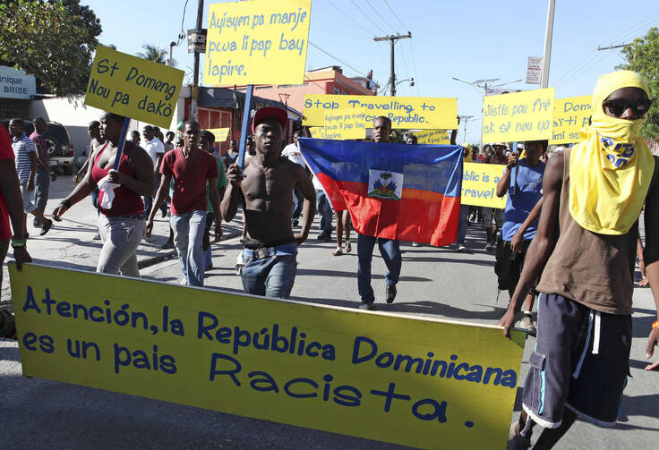 A protest in Haiti against the court ruling in December 2013