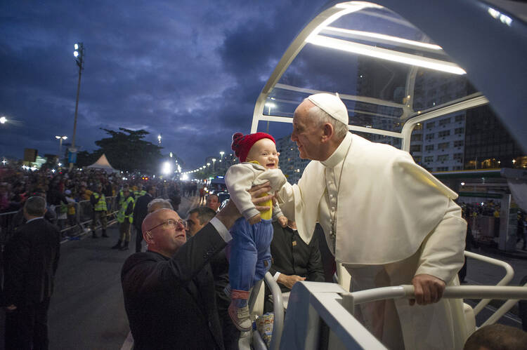 Happy baby and the pope