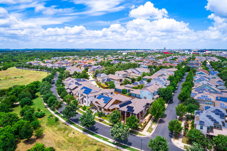 The Mueller neighborhood, in Austin, Tex., was designed to increase the use of solar power. (iStock/JamesBrey) 