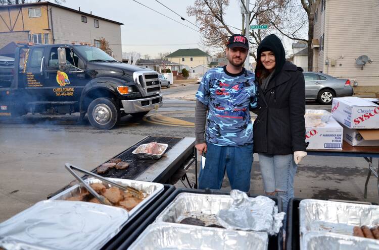 Volunteers on Staten Island, New York, distribute food in the wake of Hurricane Sandy in November 2012. The challenge is maintaining such enthusiasm among mutual aid groups in the long run. (iStock/AnnaLauraWolff)
