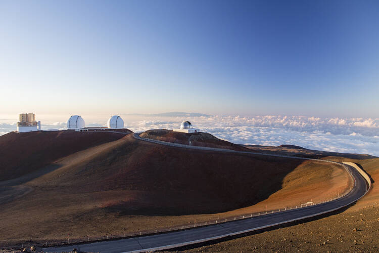 Mauna Kea is already dotted with telescopes, but T.M.T. would dwarf them all. (iStock/Jarin13)