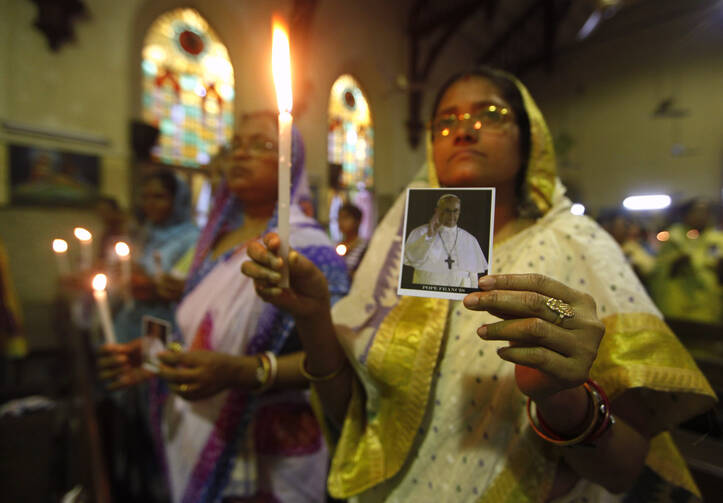 Women in India celebrate Pope Francis in 2013