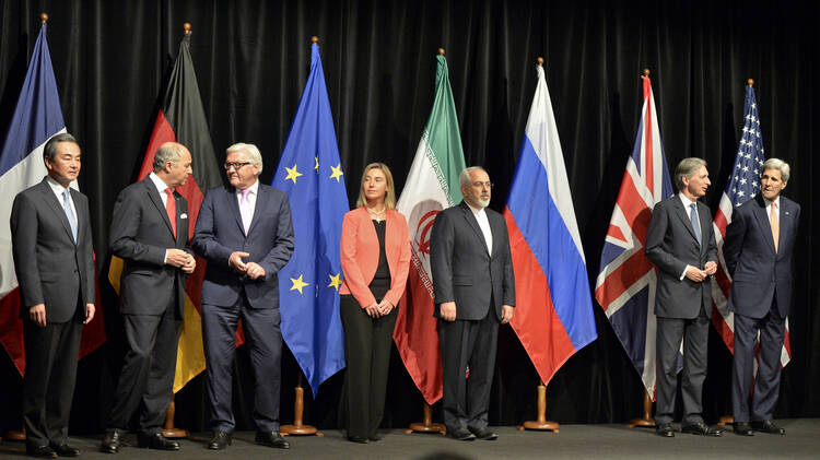 World leaders take part in a press conference July 14 after reaching a nuclear deal with Iran (CNS photo/Herbert Neubauer, EPA). 
