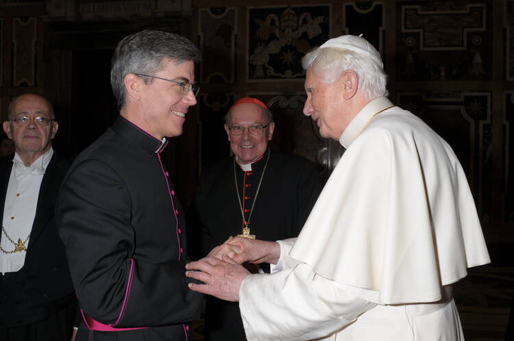 Archbishop Charles J. Brown, apostolic nuncio to Ireland, is pictured being greeted by retired Pope Benedict XVI in 2010. 
