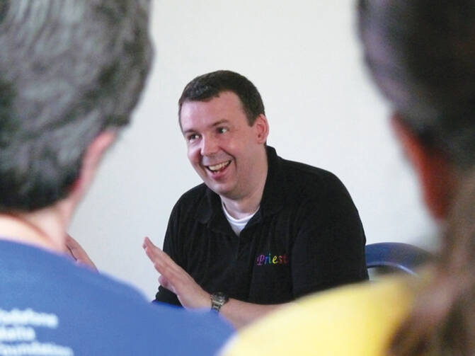 Father James Alison at a talk at the University of Malta.