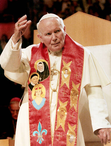 Pope John Paul II meets with a gathering of cheering youths in St. Louis in 1999.