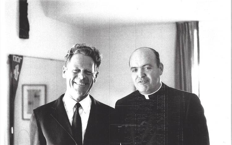 Eugene C. Kennedy, right, pictured with Hans Kung.