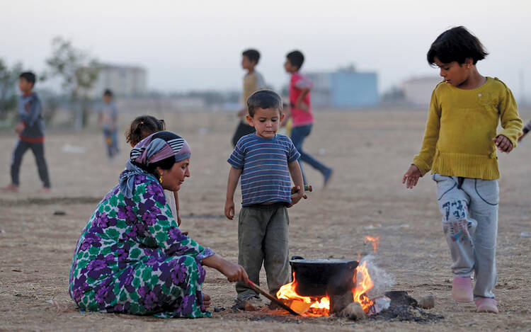 ￼HOME FIRE. A Kurdish refugee woman from the Syrian town of Kobani.