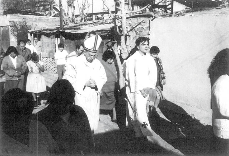 Slum bishop. Archbishop Jorge Mario Bergoglio, center, and the Rev. José María de Paola, right, visit the Villa 21-24 neighborhood in Buenos Aires in 1998. 