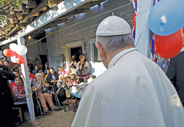 HOUSE CALL. Pope Francis visits the Bañado Norte neighborhood, a slum in Asuncion, Paraguay, July 12, 2015.