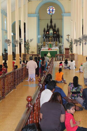 HAIL MARY. Pilgrims at Madhu Church