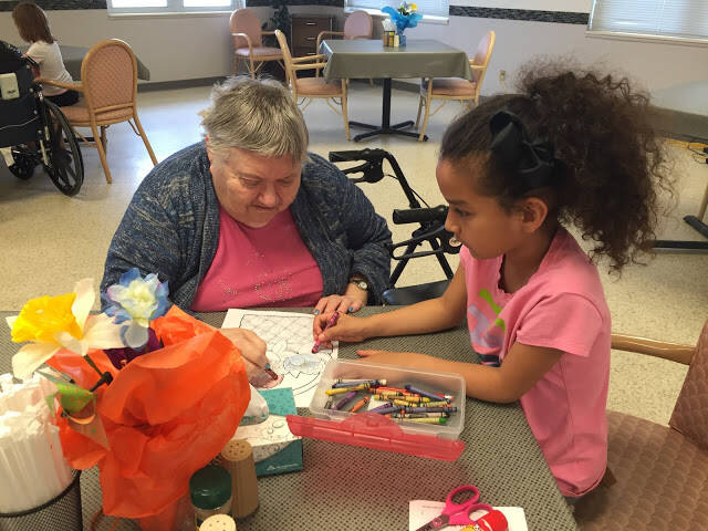 Mandy visiting a resident of the local nursing home