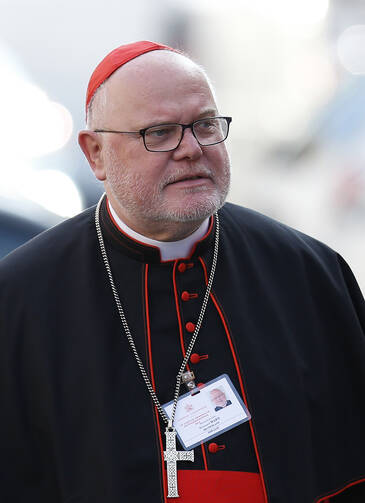 Cardinal Reinhard Marx of Munich and Freising, Germany, arrives for the morning session of the extraordinary Synod of Bishops on the family at the Vatican Oct. 7. (CNS photo/Paul Haring)