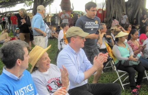 Ethel Kennedy (center) is joined by America's Matt Malone, S.J., and her grand daughter's husband Liam Kerr (left without hat) at a demonstration on behalf of Florida farmworkers. Photo: Anne Geggis - Sun Sentinel