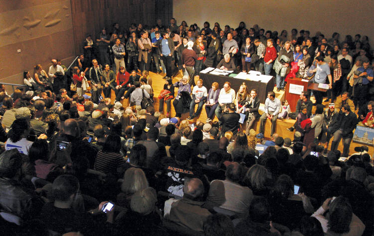 THE AMERICAN WAY. People participate in the Democratic caucus at the Iowa State Historical Society in Des Moines, Iowa, Feb. 1, 2016. 