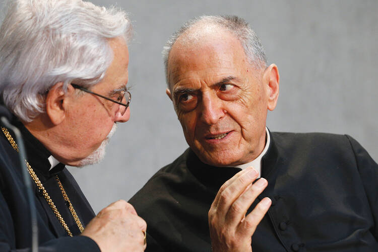 MARRIAGE COUNSELORS. Bishop Dimitrios Salachas of Greece, left, talks with Msgr. Pio Vito Pinto, dean of the Roman Rota, a Vatican court.