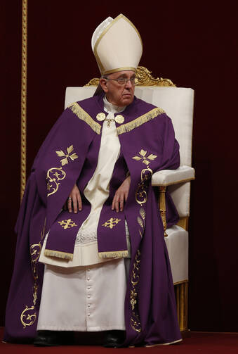 Pope Francis leads a Lenten penance service in St. Peter's Basilica at the Vatican, March 13.