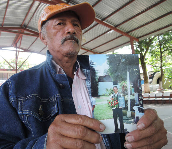 Father of missing student displays photo in Mexico