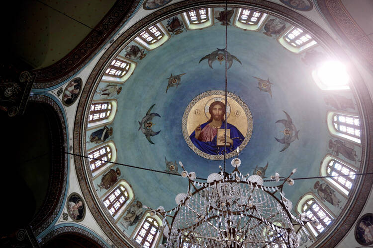 A painting of Jesus Christ on the ceiling of St. George Church in Old Cairo, Egypt, Tuesday, Aug. 30, 2016. (AP Photo/Nariman El-Mofty)