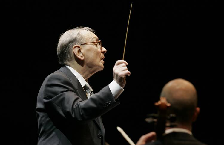 Ennio Morricone conducts during the Mawazine Festival in Rabat, Morocco, in 2009.