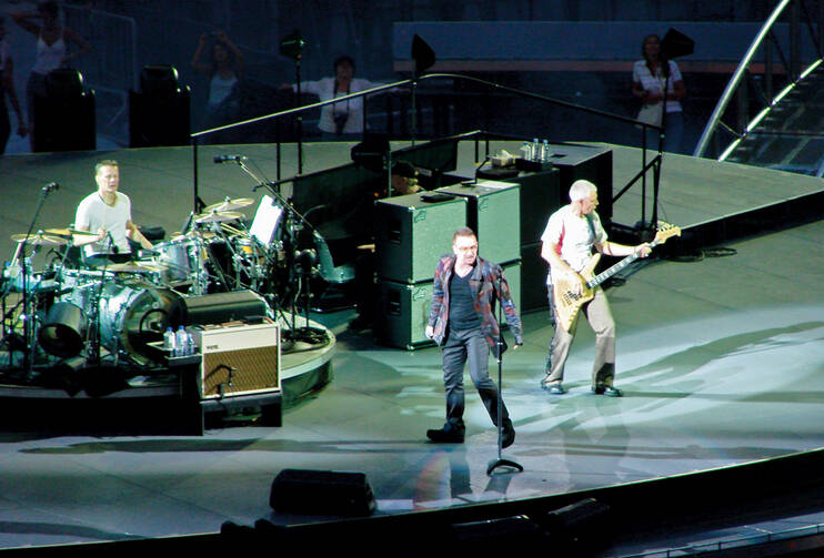 NEW EVANGELISTS? U2 performs in Milan, Italy.