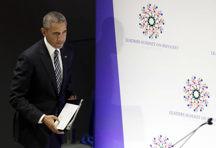 President Barack Obama walks to the podium to speak during the Leaders Summit on Refugees during the 71st session of the United Nations General Assembly at UN headquarters, Tuesday, Sept. 20, 2016. (AP Photo/Carolyn Kaster)