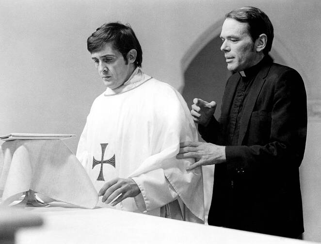William J. O'Malley, S.J., right, as Father Dyer, in "The Exorcist." Jason Miller, left, played Father Damian Karras.