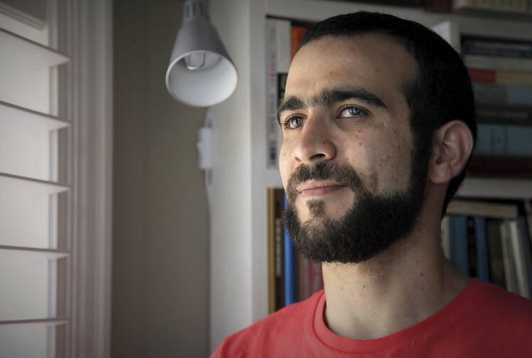 Former Guantanamo Bay prisoner Omar Khadr, 30, is seen at a home in Mississauga, Ont., on July 6. (Colin Perkel/The Canadian Press via AP)
