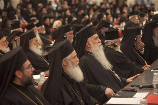 HISTORY MAKING. Orthodox Bishops attend the closing session of the Holy and Great Council at Kolymvari town on the island of Crete, Greece, June 26 (Sean Hawkey/ Holy and Great Council via AP).