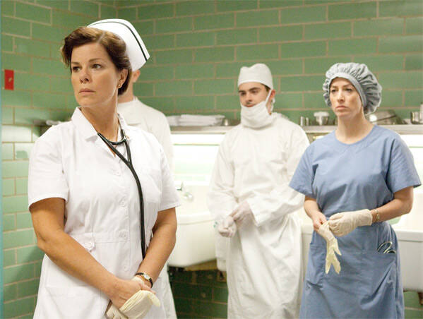 Collateral Damage: Marcia Gay Harden, left, and Zac Efron, center, in 'Parkland'