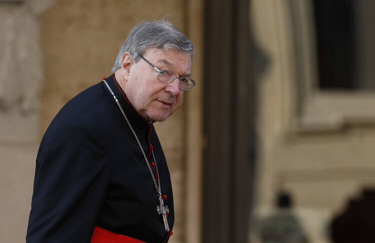Australian Cardinal George Pell, prefect of the Vatican Secretariat for the Economy, arrives for the opening session of the extraordinary Synod of Bishops on the family at the Vatican Oct. 6. (CNS photo/Paul Haring)