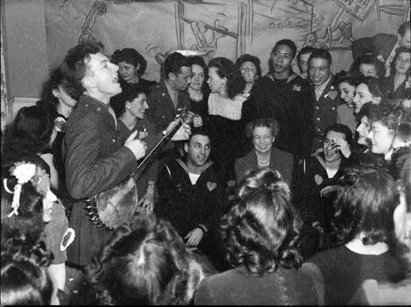 1944, Seeger opening the Washington labor canteen. Yes, that's Eleanor Roosevelt seated among the sailors.