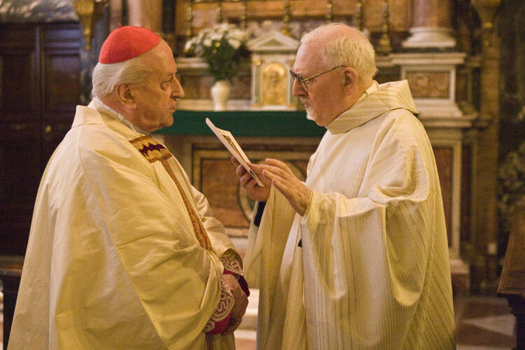 Peter-Hans Kolvenbach,S.J., right, pictured at GC 25 in 2008.