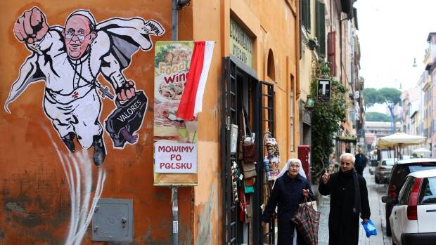 “Superpope” graffiti has sprouted up on buildings around Vatican City. (Alessandro Bianchi/Reuters)