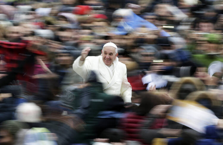 Pope Francis arrives for his weekly audience in St. Peter's Square, Nov. 27
