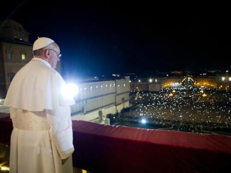 The newly elected Pope Francis before the multitudes, March 13, 2013.