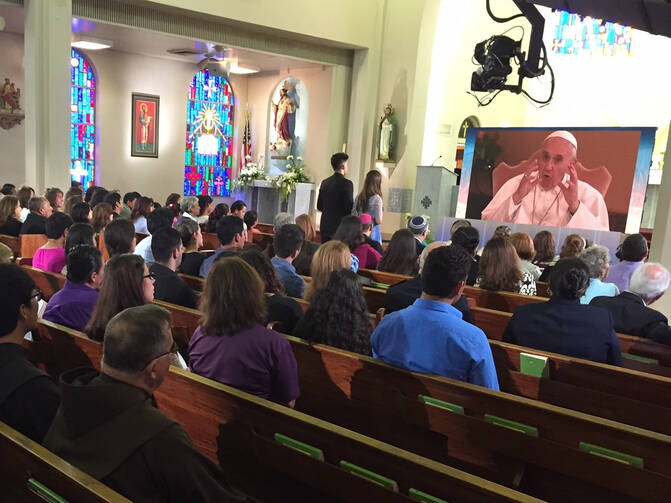 Members of Sacred Heart Church in McAllen, Texas, participate in virtual town hall meeting with Pope Francis.