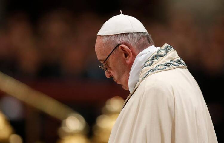 Pope Francis is pictured during vespers on New Year's Eve in St. Peter's Basilica at the Vatican Dec. 31. (CNS photo/Paul Haring) 