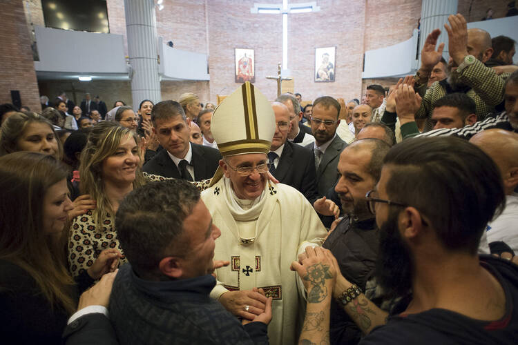 Corporal Worker. Pope Francis visits prisoners in Italy.