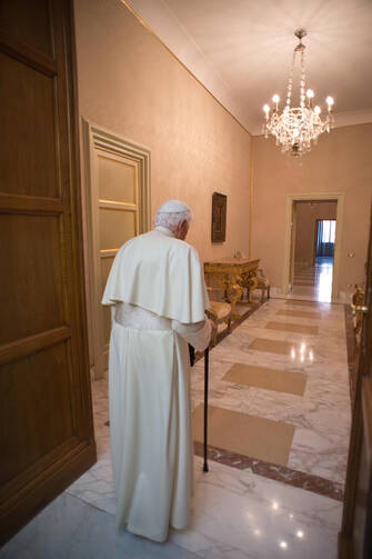 Pope Benedict XVI retires to the apartment at his summer residence in Castel Gandolfo, Italy, Feb. 28, after appearing for the last time at the balcony of the residence. 